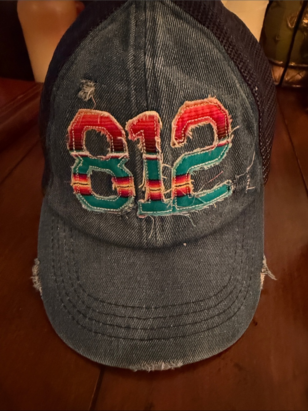 Distressed Denim Trucker Hat with Colorful '812' Patch